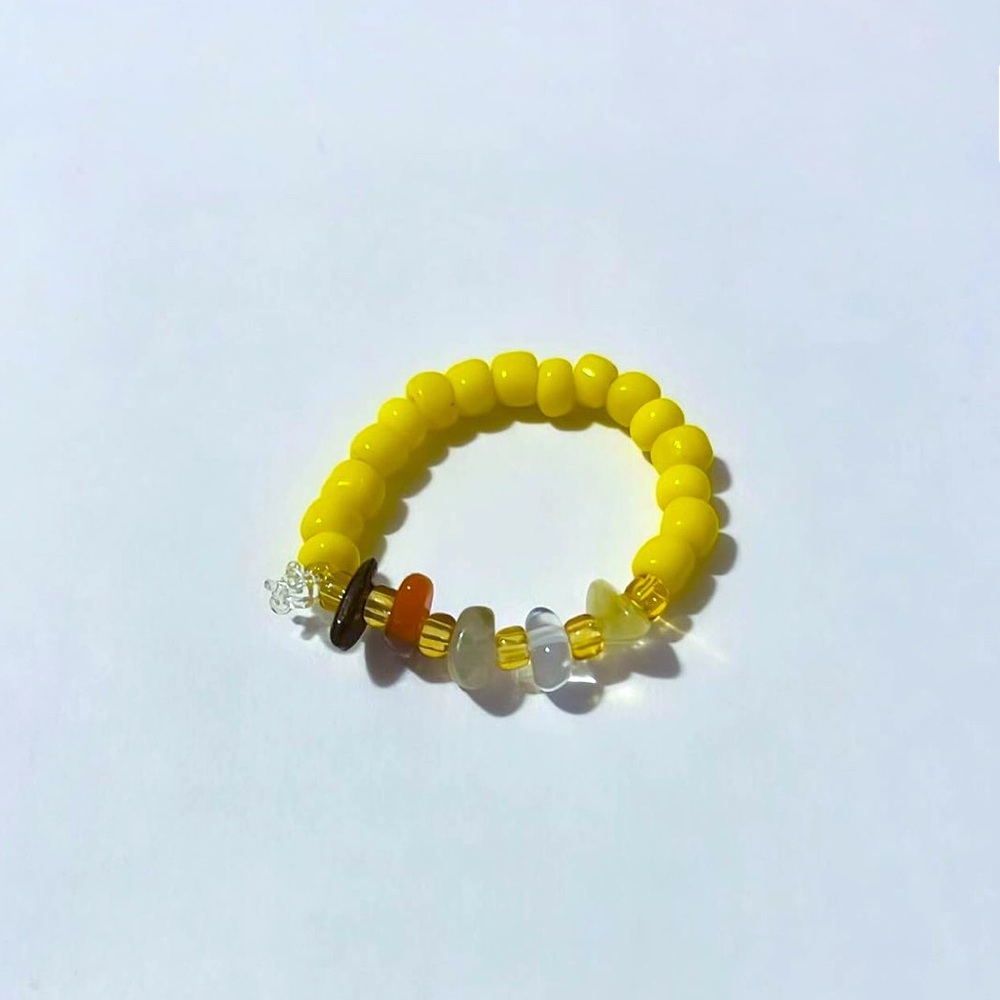 Yellow ring with crystal